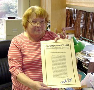 Pat Wherry with a copy of the Congressional Record submission.