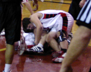 J.D. Riener was on top of a pile going for a loose ball in the Troy game.