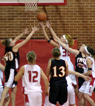 Natalie Arnzen rebounds a missed free throw.
