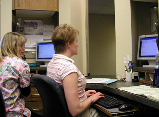 Meditechs Kelly Williams and Cara Uhlenkott input data.