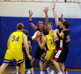 The Pirates defense surrounds the ballhandler.