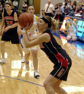 Bridget Enneking lines up a shot against Genesee.