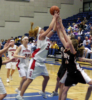 Natalie Arnzen grabs a rebound.