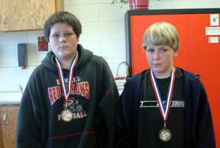 Mike Karel and Joshwa Zigler, the top two finishers in the spelling bee.