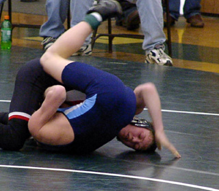 James Jackson has just pinned a Grangeville opponent to advance to the championship match.