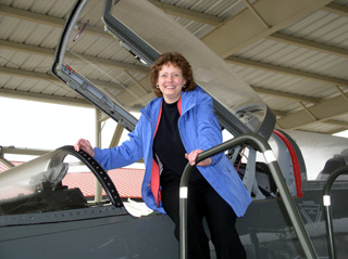 Nancy Uptmor on one of the fighter jets.