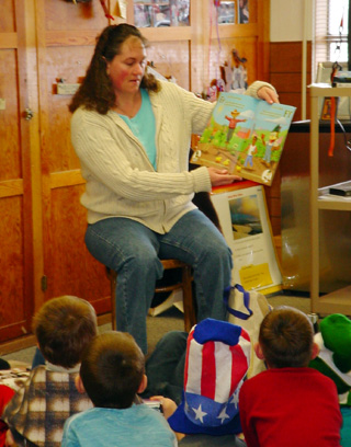 Sheri Chaffee reads to the Kindergarten Red Group.
