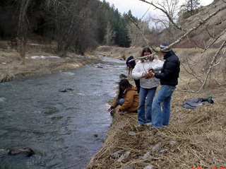 Prairie Middle School students at an outdoor science event at Lawyer's Creek.