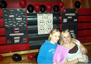 Heather Schumacher and Sarah Forsmann with their psych fair exhibit.