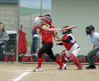 Brooke Holthaus collecting one of her 8 hits on the day. She had 4 each in the varsity and JV games against Moscow.