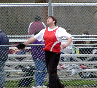 J.D. Riener tosses the discus. He won with a mark of 139'9.