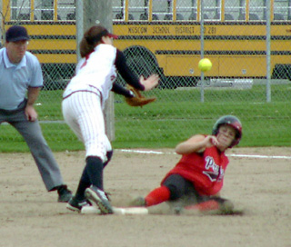 Lindsey Crea slides into second with a stolen base against Moscow.