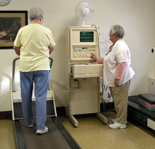 Mary Watson, RN, demonstrates some equipment in the SMH Cardiac Rehab Department.