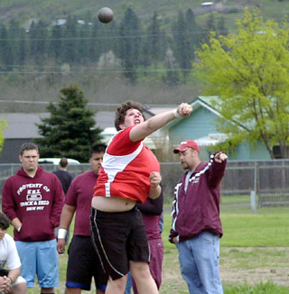 J.D. Riener set a personal best in the shot put on this throw.