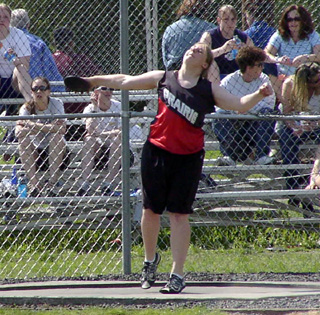 Charlene Duman throws the discus.