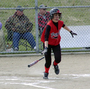 All Holthaus heads for first after making contact.