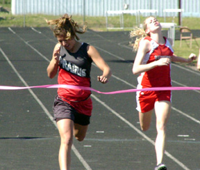 Nicole Nida beat the defending state champ to win the 200 at Regionals, breaking the meet record in the process.