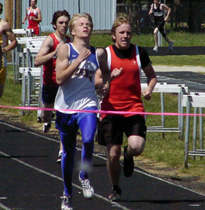 Tim Russell broke his personal record by a bunch to qualify for state in the 800. He finished third.