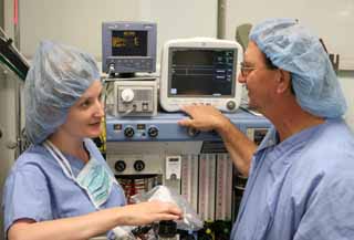 Dennis Tracy, Certified Registered Nurse Anesthetist and Peggy Goeckner, OR Tech, work together to prepare for colonoscopy procedures.