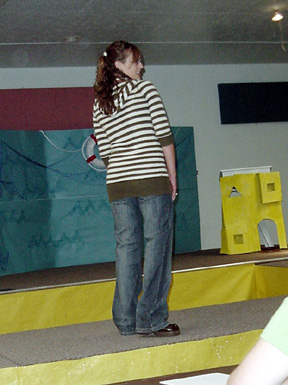 Kristi Poxleitner models for the judges.