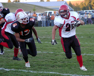 Dan Riener gains big yardage on a sweep to the left.