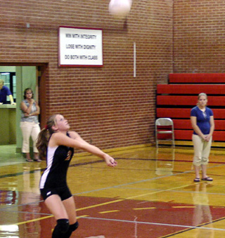 Kim Schaeffer passes a Genesee serve to the setter.