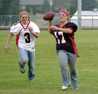 Meghan VanderPas looked to pass but wound up running on this play. Chantel Boniecki tries to chase her down.