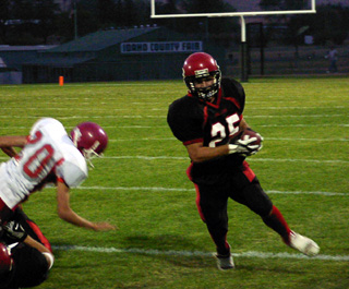 Danny Riener turns the corner on his way to a big gain.