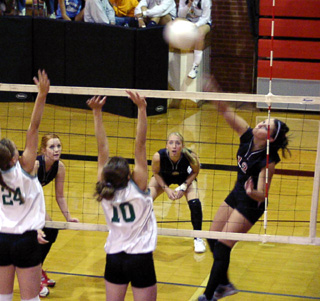 Brooke Holthaus goes for the kill against Potlatch.
