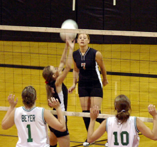 Gina Holthaus sets the ball during the Prairie Tournament.