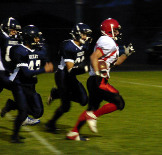 Danny Riener breaks through the defense on a 44-yard touchdown run.