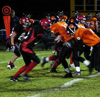 Corey Schaeffer is about to take on a Kendrick blocker from his defensive end position.