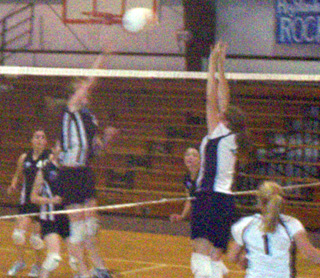 Alexa Prigge going up for a block against PCCS Highlanders from Lynnwood, WA.  We split with the Highlanders.