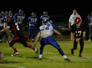 Kyle Holthaus apparently fooled the Genesee defender on this handoff to Danny Riener, left.