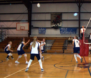The girls are set and ready to receive the serve from the Logos Knights from Moscow, ID.