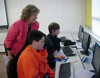 Josh Zigler, Nancy Uptmor and Justin Schmidt check out career opportunities on the computer.