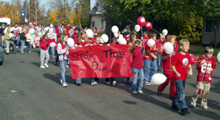 Elementary students displayed their anti-drug banners during the parade.