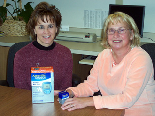 Becky Ewing, RN, Certified Diabetes Educator, right, shows Debbie Schumacher some of the equipment she'll be discussing at a program on Diabetes in Cottonwood on December 4 and in Kamiah on December 5.