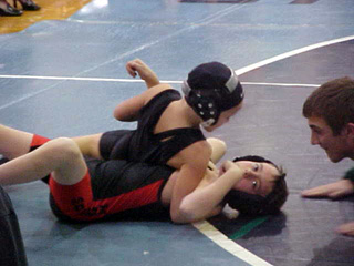 Kellie Heitman appears to have pinned her opponent.