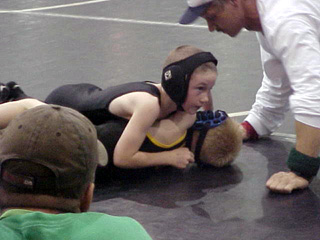 Hunter Chaffee is about to score a pin.