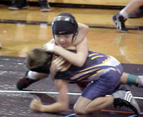 Kellie Heitman attempts to roll her opponent.