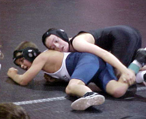 Seth Chaffee tries a move on his opponent.