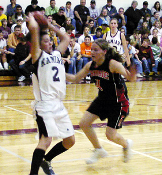 Jennifer Enneking guards a Kamiah player as Prairie used full-court defense most of the game against the Kubs.