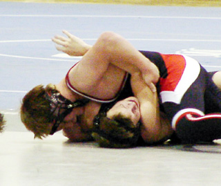 Brandon Poxleitner is about to pin this opponent.