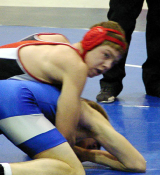 Jake Wimer looks to the coaches for advice on what to do next.