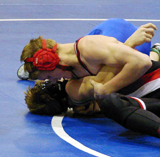 Ron George pinned this opponent within seconds of this photo.