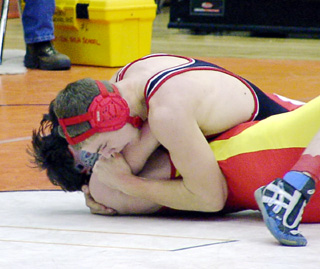 Jake Wimer appears about to pin this opponent.