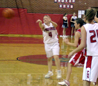 Jennifer Enneking makes a pass against C.V.
