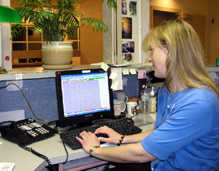 Vicky Petersen, RN, CVHC, works on developing a software module for the CVHC/SMHC Meditech system which will provide electronic medical records. A grant from the Washington Health Information Collaborative will provide funds for development of the order entry module.