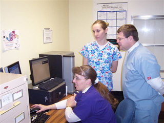 Lorinda Hughes, Jessica Stewart and Steve Wilson, SMH Radiology Department, use the new digitizing equipment purchased through a grant from the Murdock Charitable Trust.